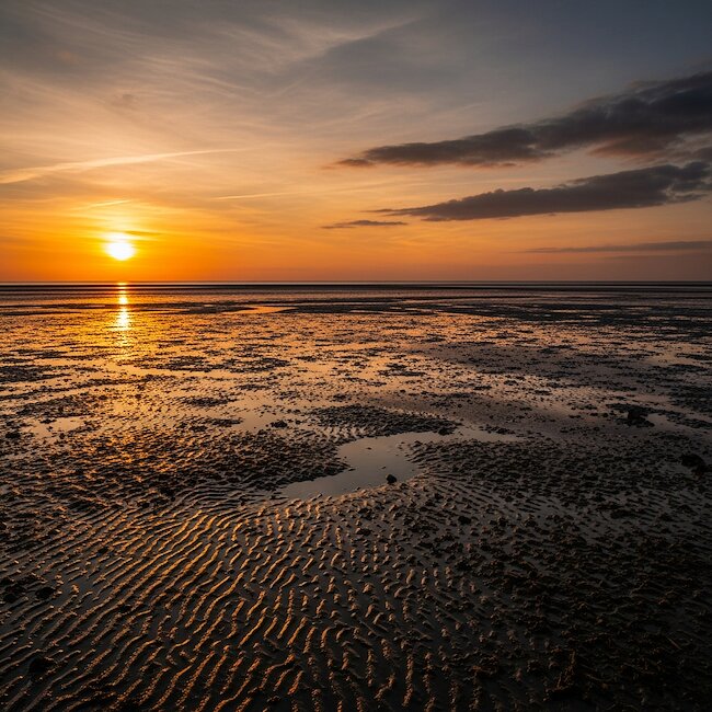Sonnenuntergang am Wattenmeer