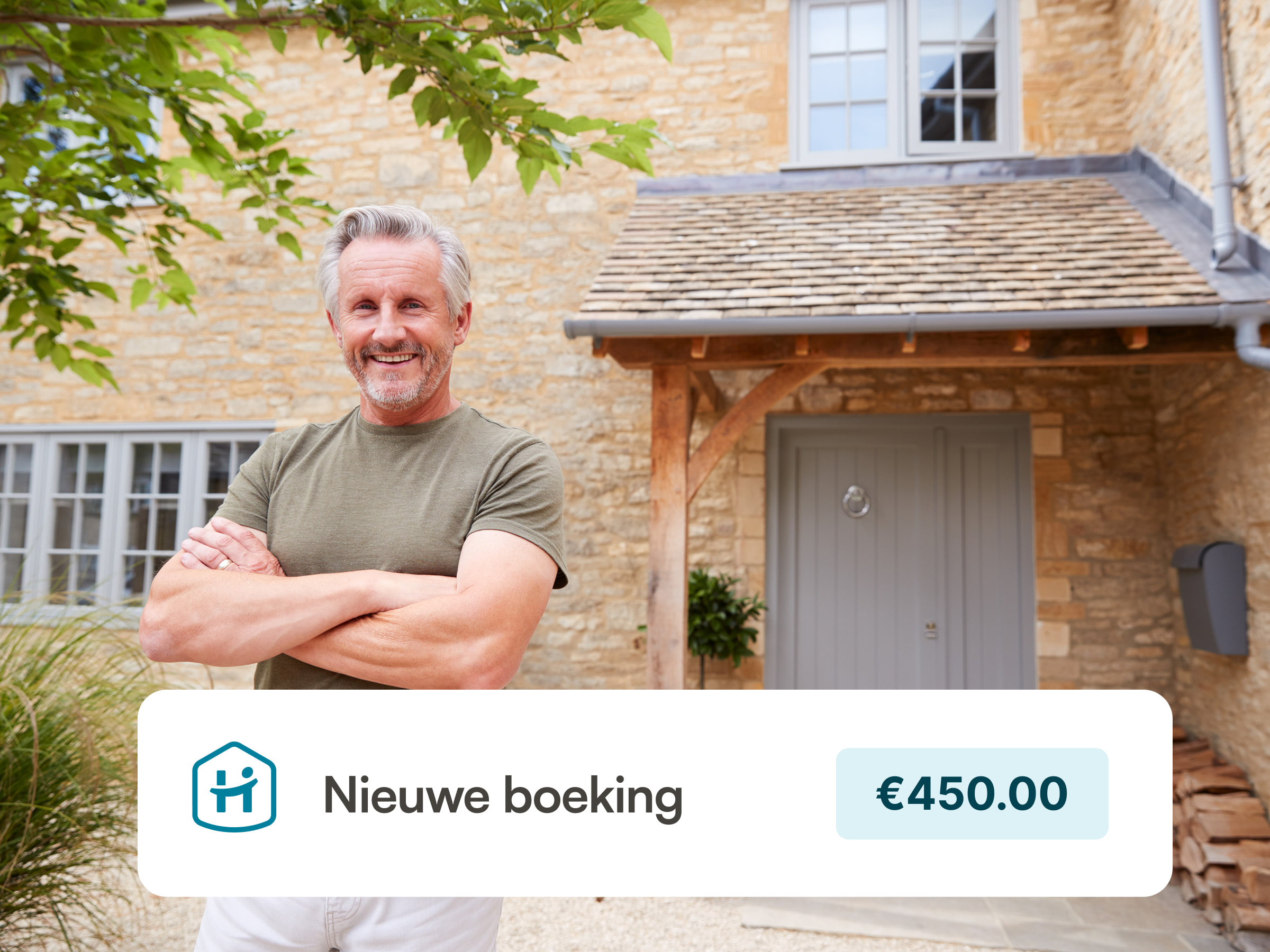 A vacation rental host is posing in front of his mallorcan style villa