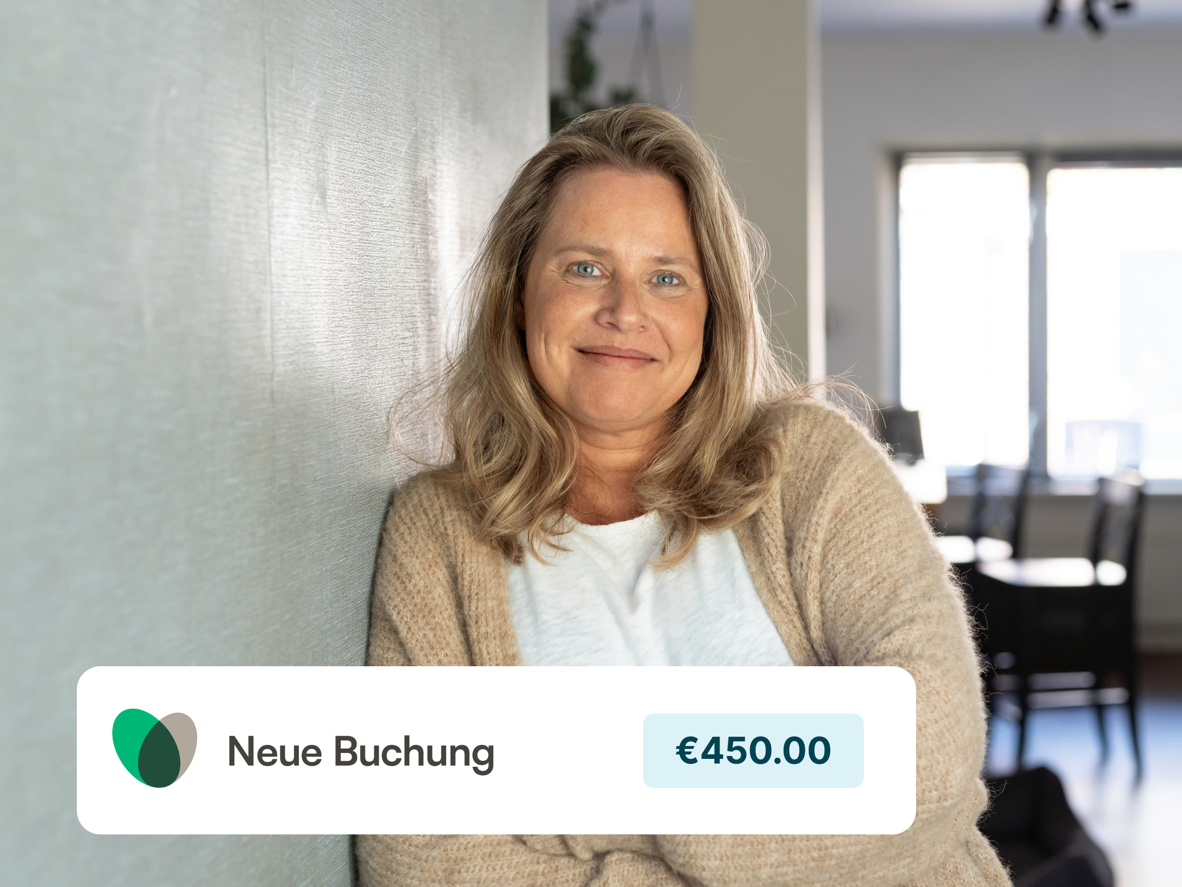A female host in her vacation rental, looking happy and confident