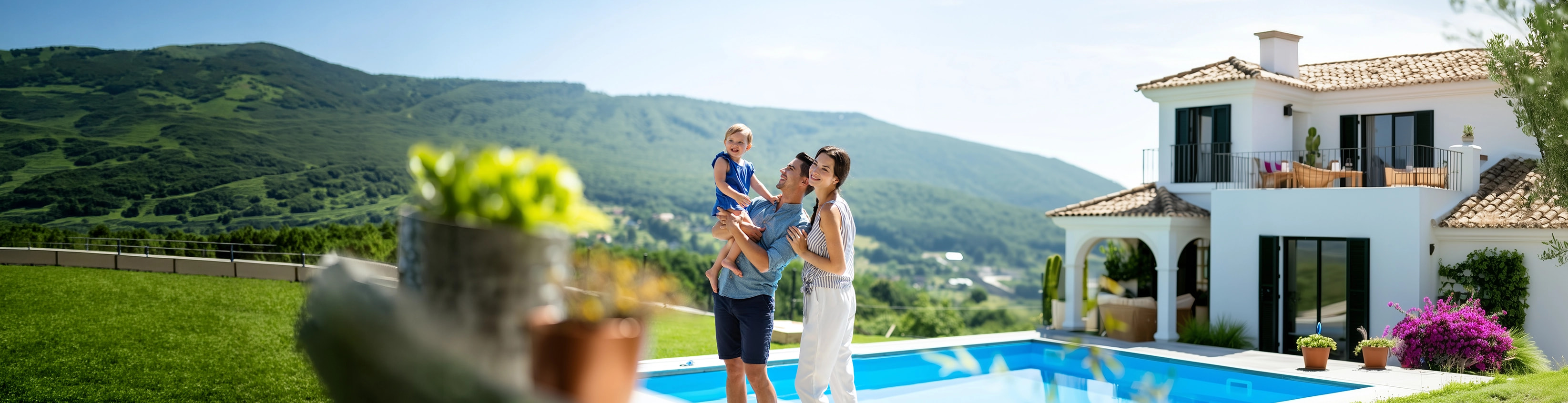 Family standing in front of their finca on Mallorca