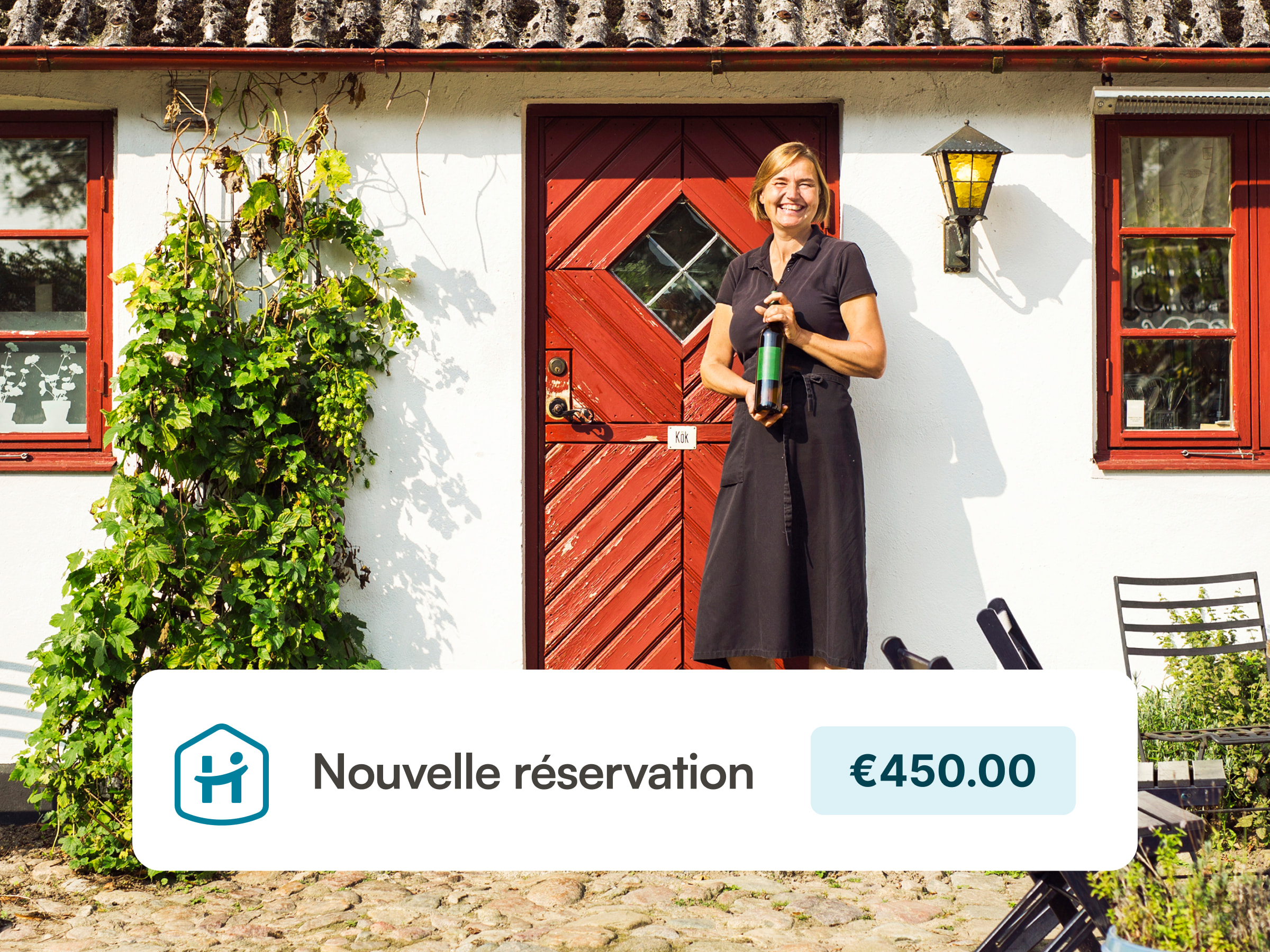 vacation rental host in front of their french cottage