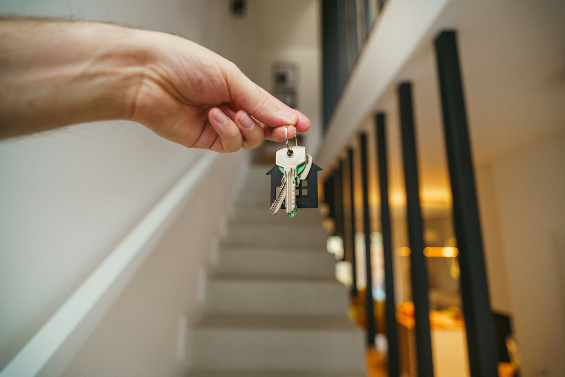 Regulations to be aware of when renting out a holiday home in Spain Someone holding a key to a holiday home