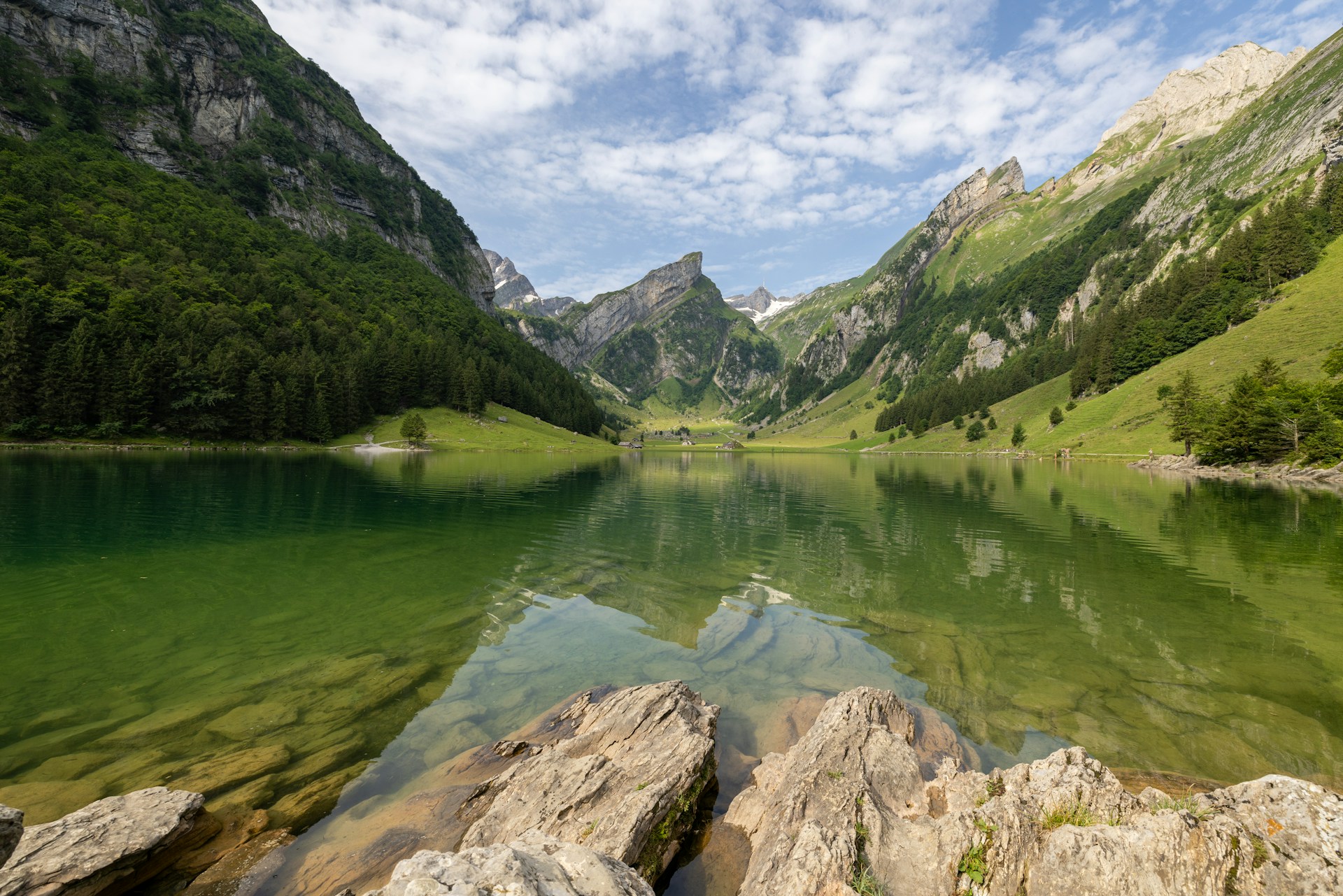 Seealpsee Andreas Slotosch via Unsplash Lake and Mountains