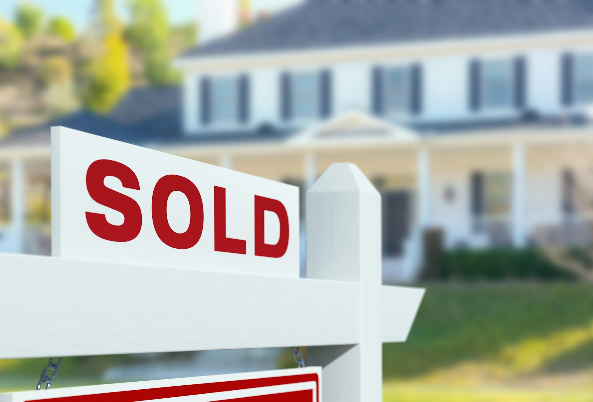 Buying a second home to rent out in the UK: where to start A sold sign outside of a property