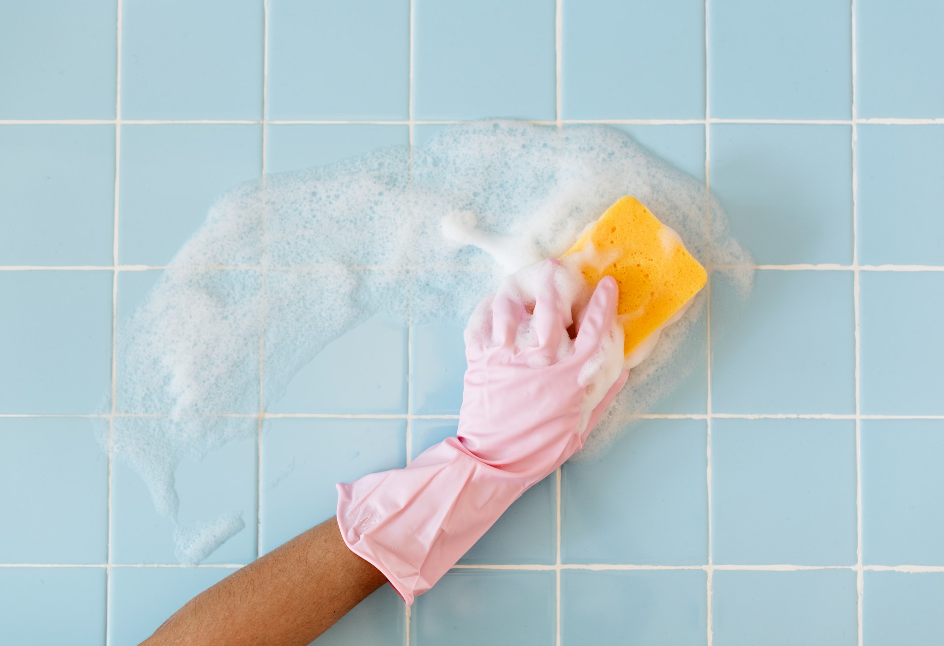 How to clean walls in your holiday rental Someone cleaning the walls in their holiday rental