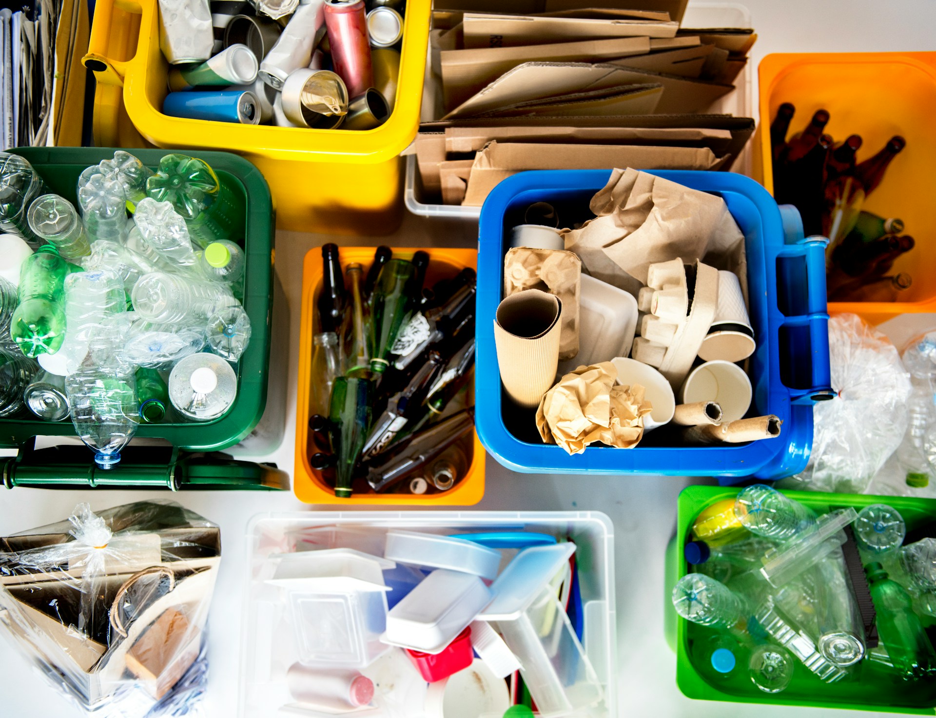 Recycling and waste rules for holiday rentals in the UK Various recycling bins in a holiday rental
